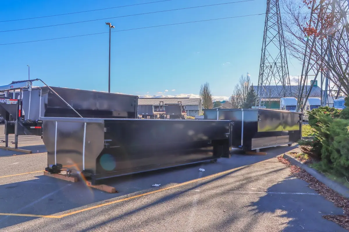 Roll-off dumpster ready for waste disposal at job site for 2 Yard Dumpster Rental in Madison